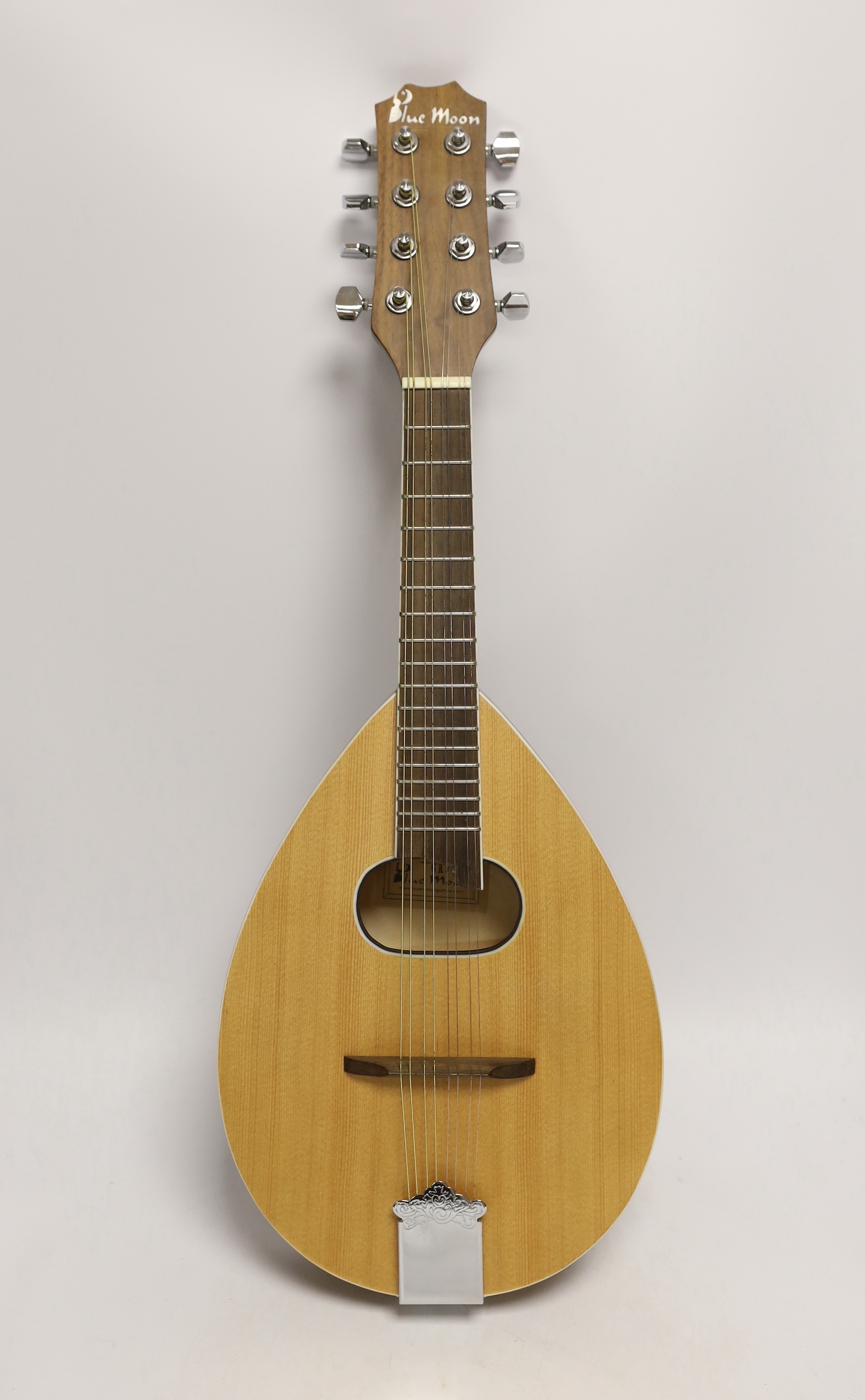 A Blue Moon tenor mandolin, overall length 63cm, in a soft canvas case